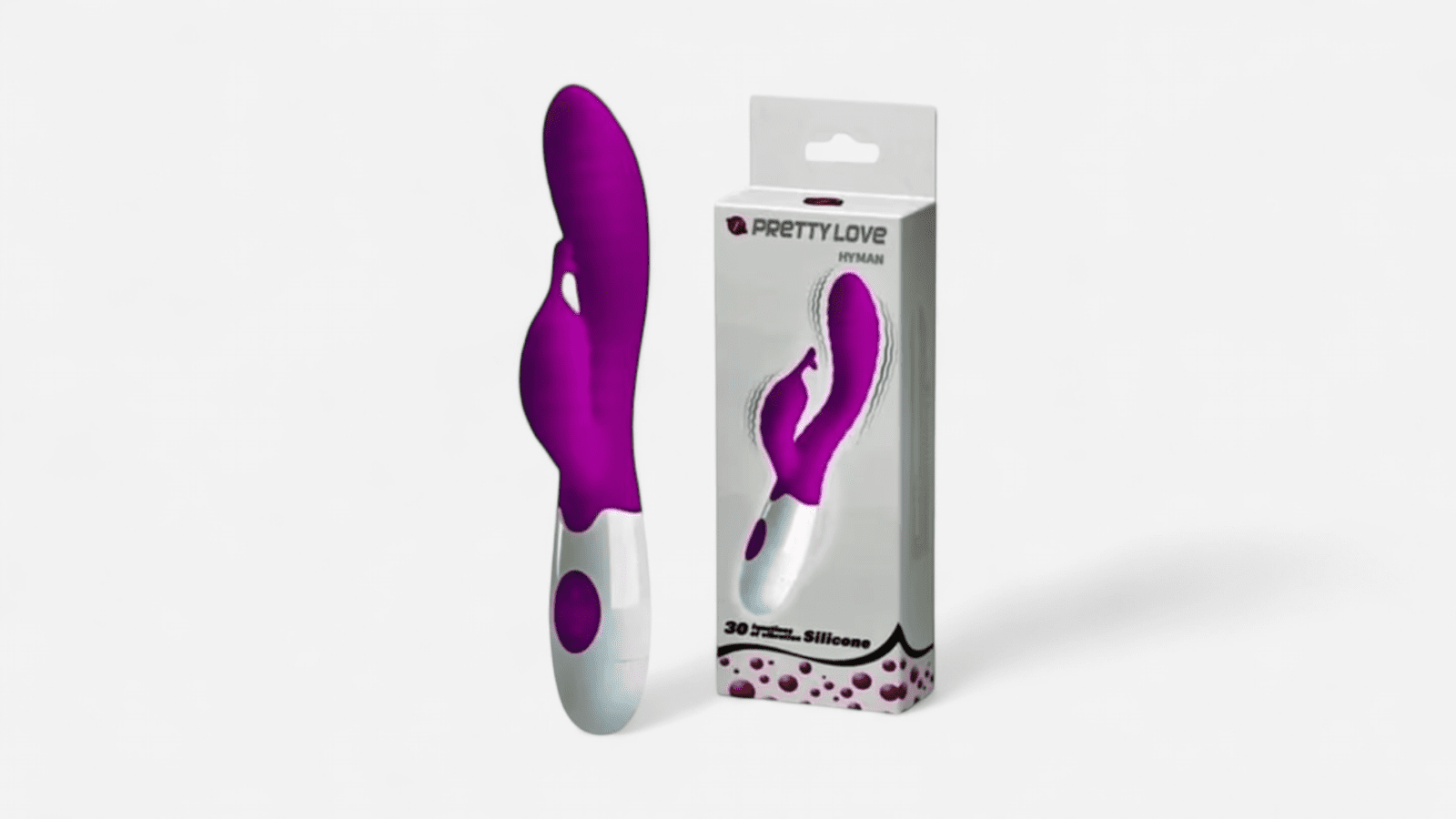 HU: Hyman Magenta vibrátor dobozzal, magenta szilikon testtel, fehér markolattal és kettős stimuláló kialakítással EN: Hyman Magenta vibrator with box, magenta silicone body, white handle and dual stimulation design