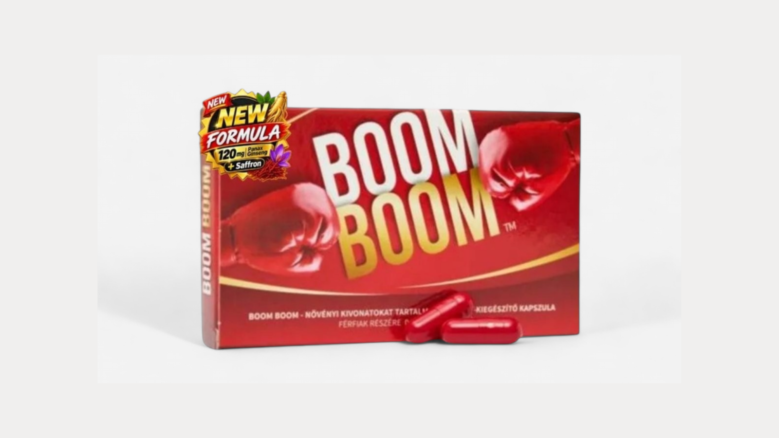 HU: Boom Boom új formula férfi potencianövelő étrend-kiegészítő 2 kapszulával, 120 mg Panax ginzenggel és sáfránnyal, piros dobozban. EN: Boom Boom new formula male potency supplement with 2 capsules, 120 mg Panax ginseng and saffron, shown in a red box.