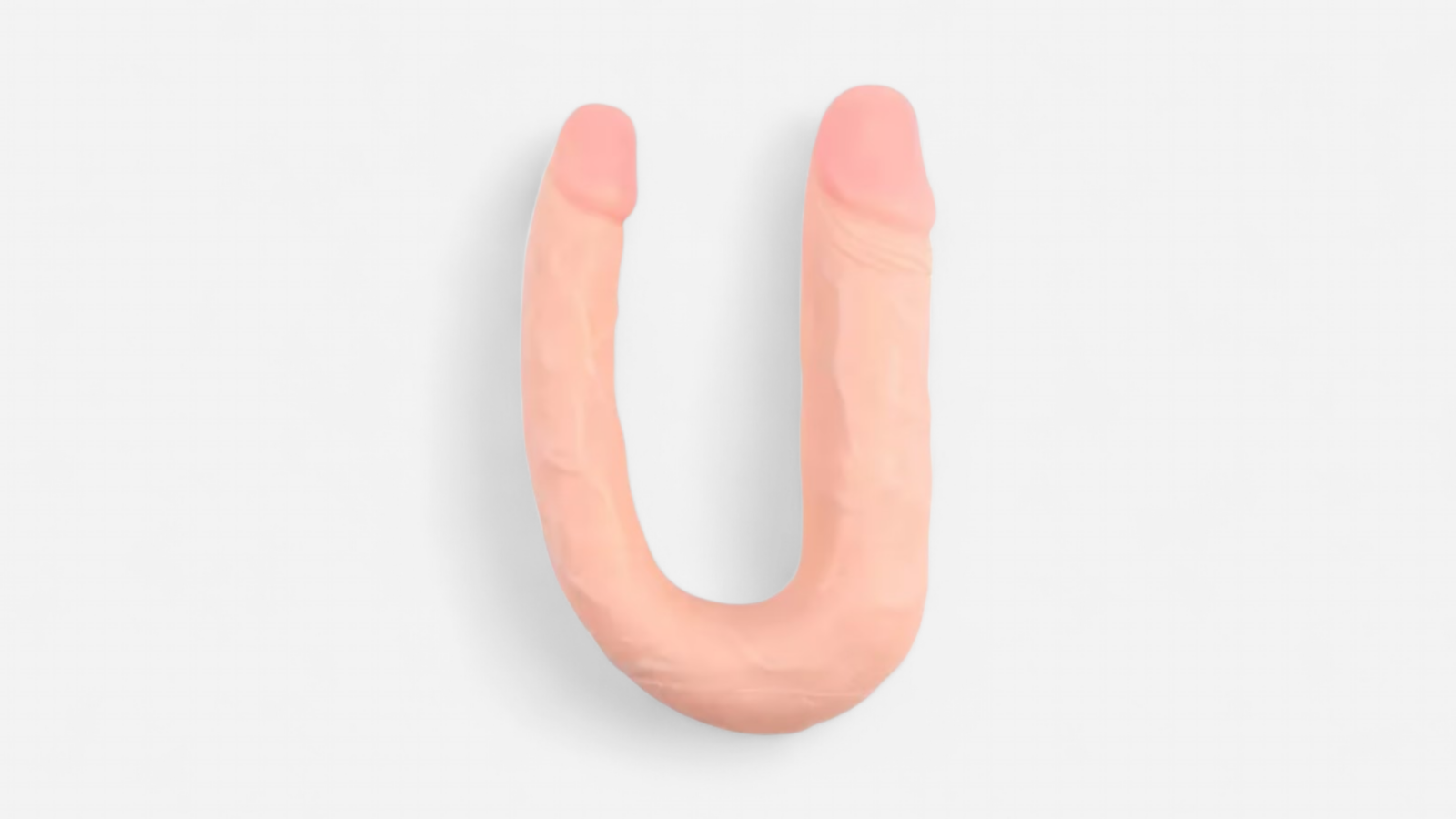 HU: Kétszer Kérem testszínű, ívelt kétvégű dildó PVC anyagból, két eltérő átmérőjű véggel EN: Kétszer Kérem flesh-colored curved double-ended PVC dildo with two different diameter ends