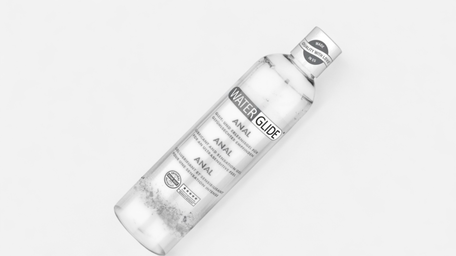 Waterglide AnĂĄl 300 ml vĂzbĂĄzisĂș anĂĄl sĂkosĂtĂł döntött flakonban, fehĂ©r hĂĄttĂ©ren, anĂĄl sĂkosĂtĂł termĂ©kfotĂł EN alt text: Waterglide Anal 300 ml water-based anal lubricant in an angled transparent bottle on a white background, anal lubricant product photo