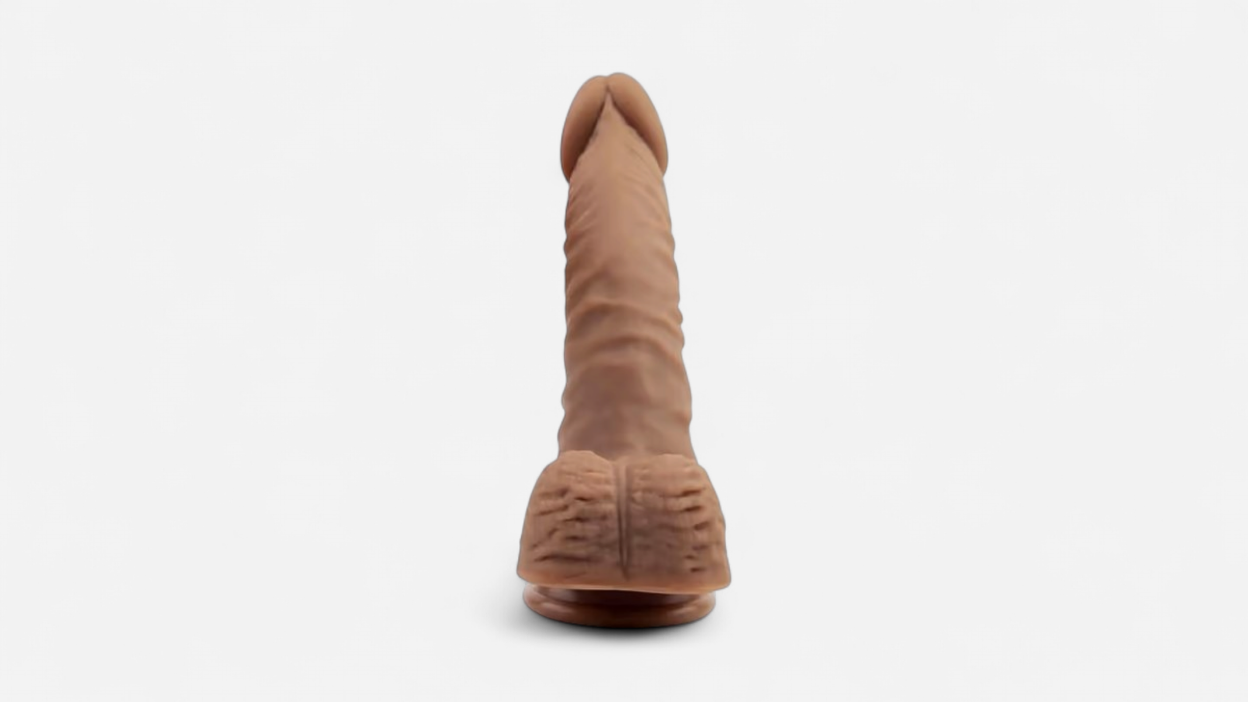 HU: The Crocked Politician realisztikus barna dildo hĂĄtsĂł nĂ©zetbĆl, rĂ©szletes herĂ©kkel, erezett szĂĄrral Ă©s tapadĂłkorongos talppal. EN: The Crocked Politician realistic brown dildo from the rear view, with detailed balls, veined shaft, and suction cup base.