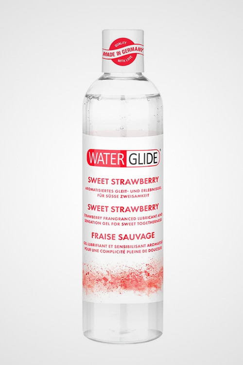 HU: Waterglide Ădes Eper 300 ml eperĂzƱ Ă©s illatĂș, vĂzbĂĄzisĂș sĂkosĂtĂł fehĂ©r hĂĄttĂ©ren. EN: Waterglide Sweet Strawberry 300 ml strawberry-flavored and scented water-based lubricant on a white background.